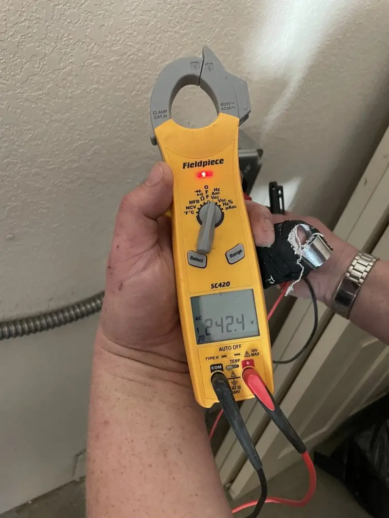 Voltage testing with clamp meter during Ceiling Fan Installation in Green Valley
